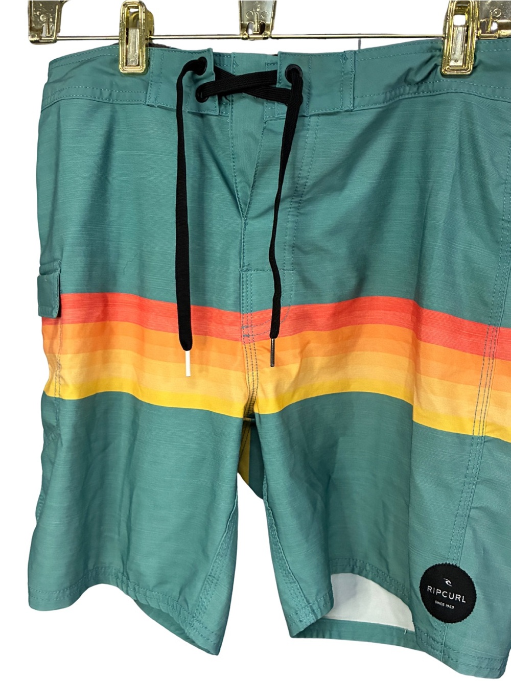 Rip Curl Teal Boardshorts with Red-Orange-Yellow Sunset Stripes